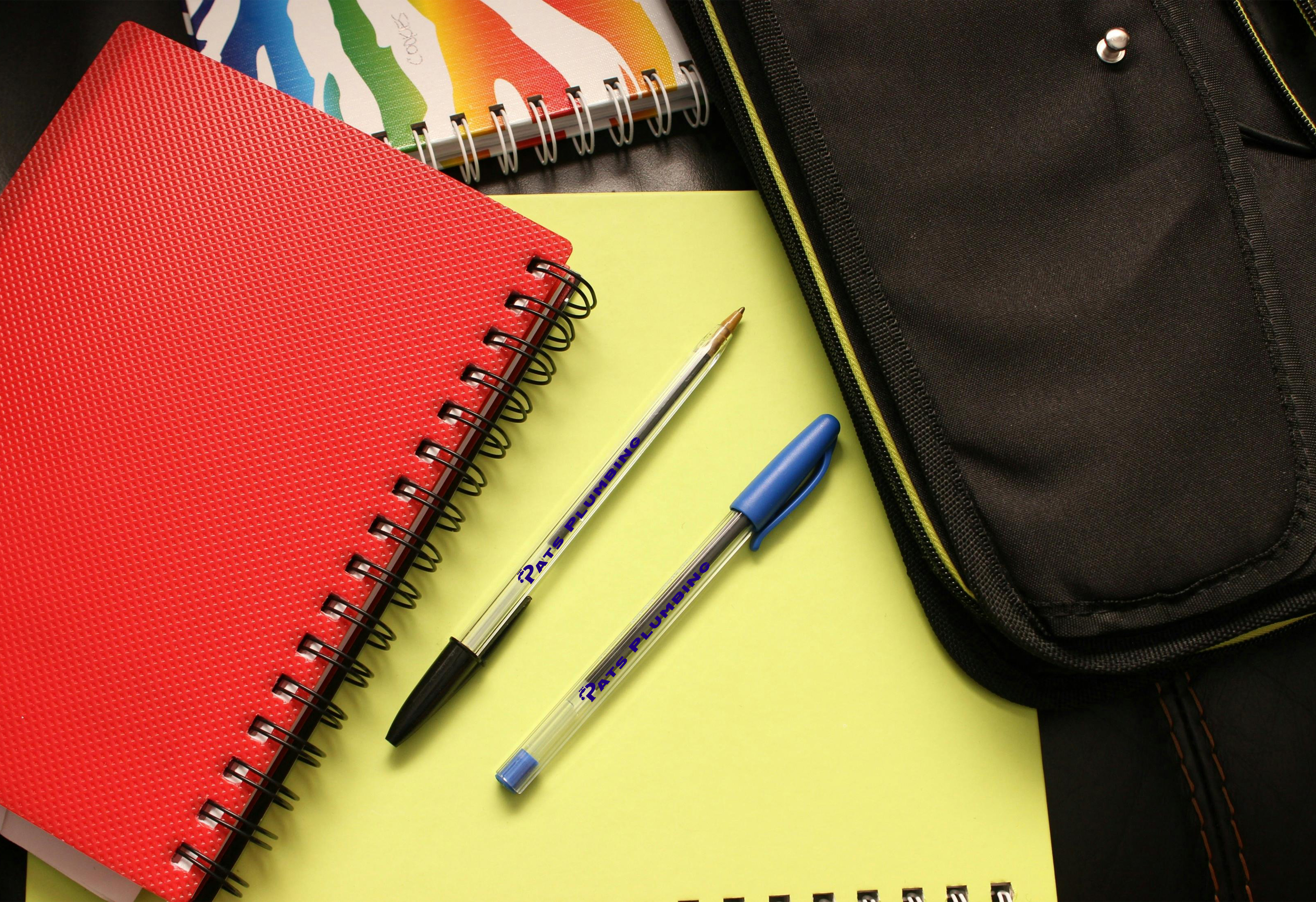 Notebooks and custom printed pens